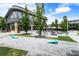 Community gathering space with picnic tables and games, ideal for residents to relax and socialize at 1661 La France Ne St # 222, Atlanta, GA 30307