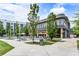 Building exterior showcasing outdoor seating and dining area, perfect for a vibrant community at 1661 La France Ne St # 222, Atlanta, GA 30307