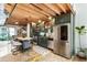 Kitchen area with stainless steel appliances, green cabinets, and a wood ceiling at 1661 La France Ne St # 222, Atlanta, GA 30307