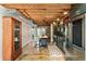 Contemporary kitchen with stainless appliances, green cabinets, and a butcher block island at 1661 La France Ne St # 222, Atlanta, GA 30307