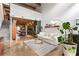 Inviting living room features an open floor plan, concrete floors, and a modern design at 1661 La France Ne St # 222, Atlanta, GA 30307