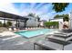 Community pool with lounge chairs and shade structure at 1661 La France Ne St # 222, Atlanta, GA 30307
