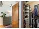 Open walk-in closet with custom shelving and ample storage at 1661 La France Ne St # 222, Atlanta, GA 30307