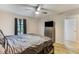Main bedroom features hardwood-style flooring, gray walls, and a ceiling fan at 1841 Mobley St, Austell, GA 30106