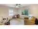 Bedroom with hardwood-style floors, a chair, and large windows at 1841 Mobley St, Austell, GA 30106