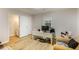 Bright bedroom adjacent to a bathroom with hardwood-style flooring at 1841 Mobley St, Austell, GA 30106