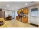 Traditional eat-in kitchen features wooden cabinetry, stainless steel appliances, and granite countertops at 1841 Mobley St, Austell, GA 30106