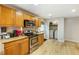 The kitchen features stainless appliances, modern lighting, and lots of cabinet space at 1841 Mobley St, Austell, GA 30106