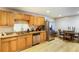 Spacious kitchen area with stainless steel appliances, and a dining space at 1841 Mobley St, Austell, GA 30106