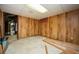 Spacious basement area with wood paneled walls ready to be finished to your liking at 3332 Clay Rd, Austell, GA 30106