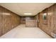 Spacious basement with wood paneling and ample room for recreation and storage at 3332 Clay Rd, Austell, GA 30106