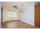 Light filled dining room with tile floors, gray walls, and a large window with view of yard at 3332 Clay Rd, Austell, GA 30106
