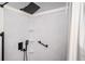 Beautiful shower with sleek fixtures, a hand-held sprayer, and grab bars at 3332 Clay Rd, Austell, GA 30106