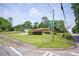 Corner lot featuring a well-maintained single-story brick home and landscaped lawn at 3332 Clay Rd, Austell, GA 30106