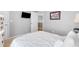Neutral bedroom featuring a double bed with white comforter and gray walls at 7335 Treyland Ct, Cumming, GA 30041