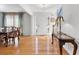Foyer with gleaming hardwood floors, stylish decor, and seamless transition to other rooms at 7335 Treyland Ct, Cumming, GA 30041