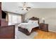 Cozy bedroom with hardwood floors and lots of light at 7335 Treyland Ct, Cumming, GA 30041