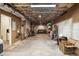 Unfinished basement with exposed ceiling, concrete floor, and storage space at 110 Windsor Chase Dr, Lawrenceville, GA 30043
