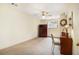 Spacious unfinished basement area featuring neutral walls, carpeted floor, and storage cabinet at 110 Windsor Chase Dr, Lawrenceville, GA 30043