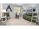 bedroom with bunkbeds, a chalkboard, and comfortable furnishings at 110 Windsor Chase Dr, Lawrenceville, GA 30043