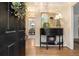 Elegant foyer with a decorative mirror and hardwood floors at 110 Windsor Chase Dr, Lawrenceville, GA 30043