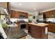 Well-equipped kitchen featuring stainless steel appliances and granite counters at 110 Windsor Chase Dr, Lawrenceville, GA 30043