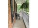Cozy porch view with a bench and lush greenery at 110 Windsor Chase Dr, Lawrenceville, GA 30043