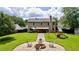Large, well-maintained backyard with a fire pit and a playset at 5388 Silver Springs Dr, Sugar Hill, GA 30518