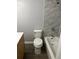 Updated bathroom with fresh tiling and modern fixtures at 5540 Kingsport Ne Dr # 18, Atlanta, GA 30342
