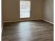 Bright bedroom featuring ample space and modern flooring at 5540 Kingsport Ne Dr # 18, Atlanta, GA 30342