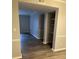 Well-lit hallway that features a storage nook with shelving at 5540 Kingsport Ne Dr # 18, Atlanta, GA 30342