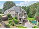 Expansive backyard with a large deck and pool area at 219 Deer Park Trl, Canton, GA 30114