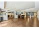 Spacious finished basement offering an open floor plan with hardwood floors, a bar area and partial kitchen at 219 Deer Park Trl, Canton, GA 30114