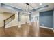 Spacious finished basement with an open floor plan, hardwood floors, recessed lighting, and traditional architectural features at 219 Deer Park Trl, Canton, GA 30114