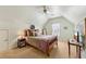Cozy bedroom with a comfortable bed, soft lighting, and a ceiling fan, creating a relaxing atmosphere at 219 Deer Park Trl, Canton, GA 30114