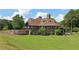 Clubhouse with a large green lawn featuring a covered porch and ample seating at 219 Deer Park Trl, Canton, GA 30114