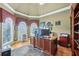 Well-lit home office with custom built-ins and multiple windows at 219 Deer Park Trl, Canton, GA 30114