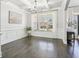 Charming dining room featuring hardwood floors, natural light, and classic trim work at 266 Hanover Dr, Villa Rica, GA 30180