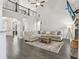 Spacious living room with fireplace, soaring ceilings, and an open floor plan at 266 Hanover Dr, Villa Rica, GA 30180