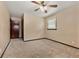 Standard bedroom featuring neutral carpet, double closet, and an exterior view at 3082 Briarleaf Dr, Decatur, GA 30034