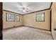 Bright and airy bedroom with neutral carpet and a double window at 3082 Briarleaf Dr, Decatur, GA 30034