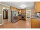 Functional kitchen featuring tile floors, wood cabinets, and stainless steel appliances at 3082 Briarleaf Dr, Decatur, GA 30034