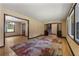 Inviting living room with hardwood floors, area rug, and natural light at 3082 Briarleaf Dr, Decatur, GA 30034
