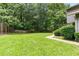 Expansive backyard with lush green grass, perfect for outdoor activities at 4908 Willow Lane Ln, Austell, GA 30106