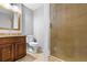 Bathroom featuring a granite countertops, a shower, and neutral walls at 4908 Willow Lane Ln, Austell, GA 30106
