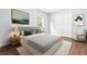 Bright bedroom featuring a neutral color palette, modern decor, and a cozy rug at 4908 Willow Lane Ln, Austell, GA 30106