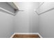 This is an empty closet with two rods for hanging clothes, ready for storage at 4908 Willow Lane Ln, Austell, GA 30106