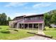 Unique exterior view of the building with modern architectural details and ample lawn space at 4908 Willow Lane Ln, Austell, GA 30106