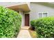 Inviting front entrance framed by lush greenery, leading to a cozy home at 4908 Willow Lane Ln, Austell, GA 30106