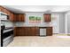 Modern kitchen featuring granite countertops and stainless-steel appliances at 4908 Willow Lane Ln, Austell, GA 30106